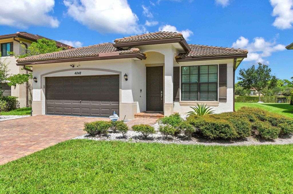 Photo of 4848 Pond Pine Way, Greenacres, FL 33463 (MLS # R11075576)