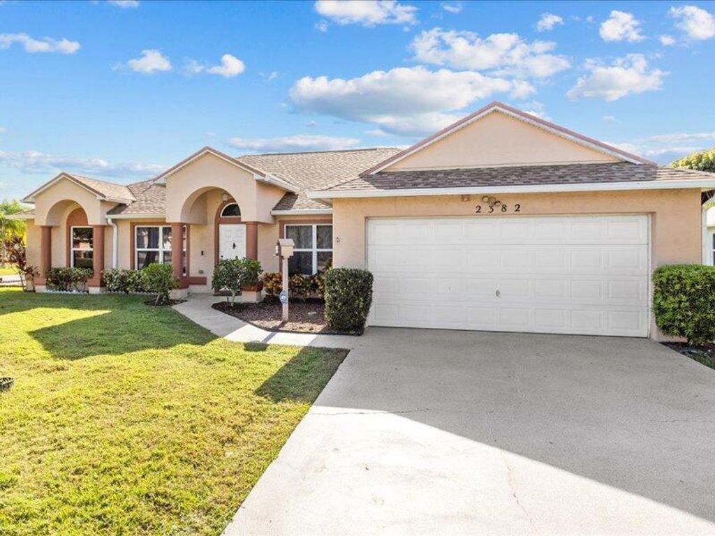 Photo of 2382 SE Melaleuca Boulevard, Port Saint Lucie, FL 34952 (MLS # R11143484)