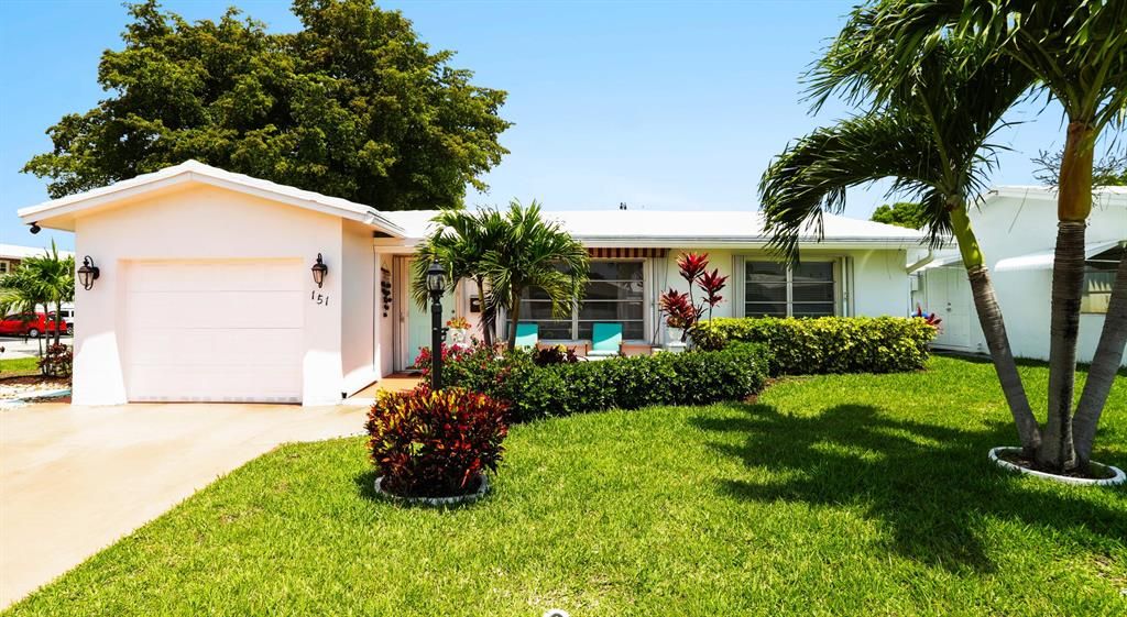 Photo of 151 NW 28 Street, Pompano Beach, FL 33064 (MLS # R10884424)