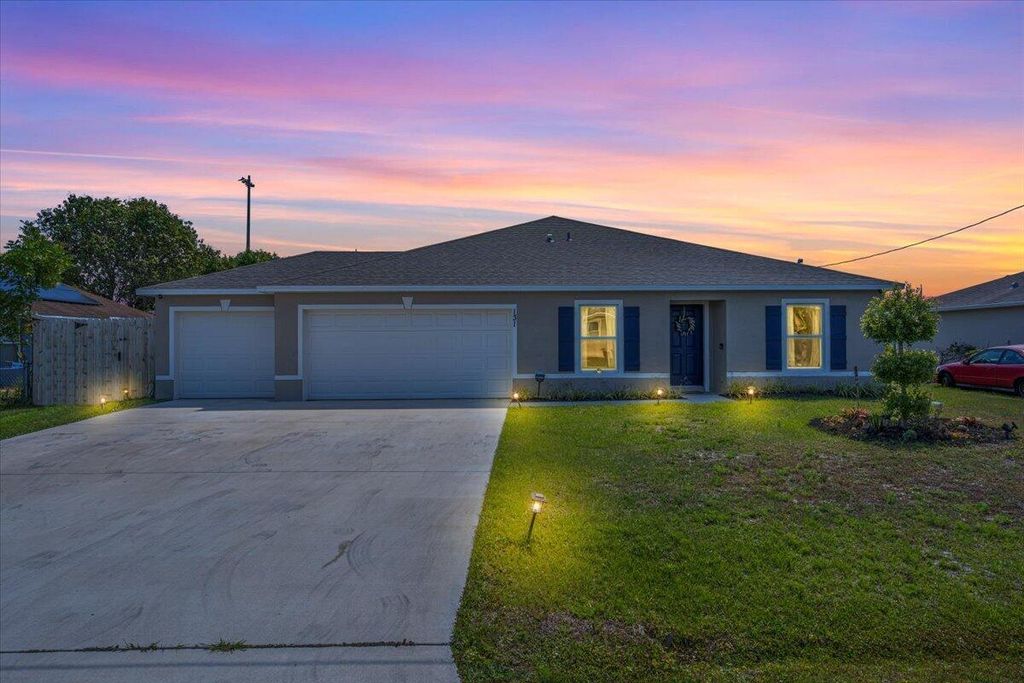 Photo of 131 NW Curtis Street, Port Saint Lucie, FL 34983 (MLS # R11081854)