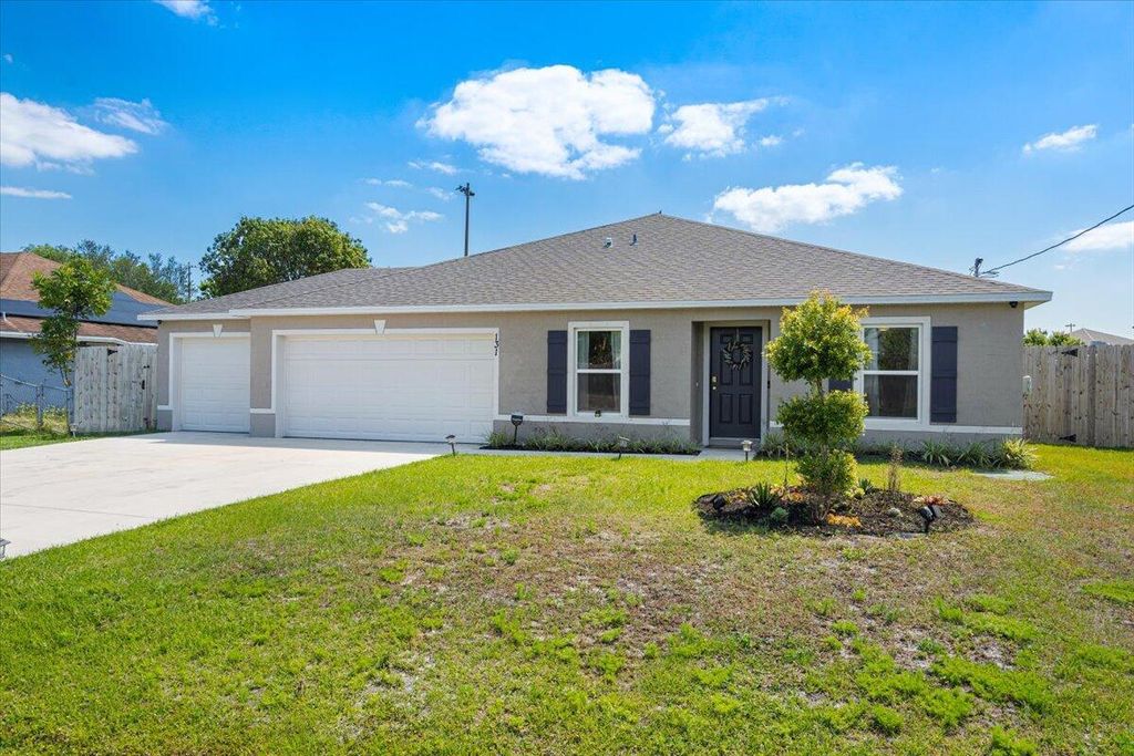 Photo of 131 NW Curtis Street, Port Saint Lucie, FL 34983 (MLS # R11081854)
