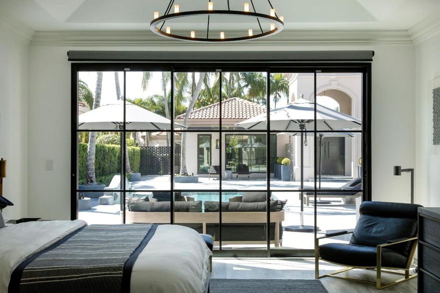 EXPERIENCE PERFECTION - Broken Sound, Boca Raton

Minimalist elegance combined with functionality defines this renovated single-floor courtyard residence in the  Broken Sound community of Boca Raton. The home unfolds with spacious living and dining areas framed by floor-to-ceiling windows, expansive terraces, and open panoramic exposure from principal rooms. The chef's kitchen features top-of-the-line cabinetry, luminous quartz countertops, upgraded fixtures, designer accents, and state-of-the-art lighting designed for everyday performance. The layout includes four bedrooms plus a flexible den, a private courtyard pool, and a dedicated media room, reflecting comprehensive updates and thoughtful design. Broken Sound Club offers refined amenities including two award-winning championship golf courses, a golf performance center and pro shop, twenty-three Har-Tru tennis courts, the Moonstone full-service spa, a waterside aquatic center, numerous dining options, twenty-four-hour manned gate entry, and roving security patrols within the gated Boca Raton community. Broken Sound Club membership is mandatory.