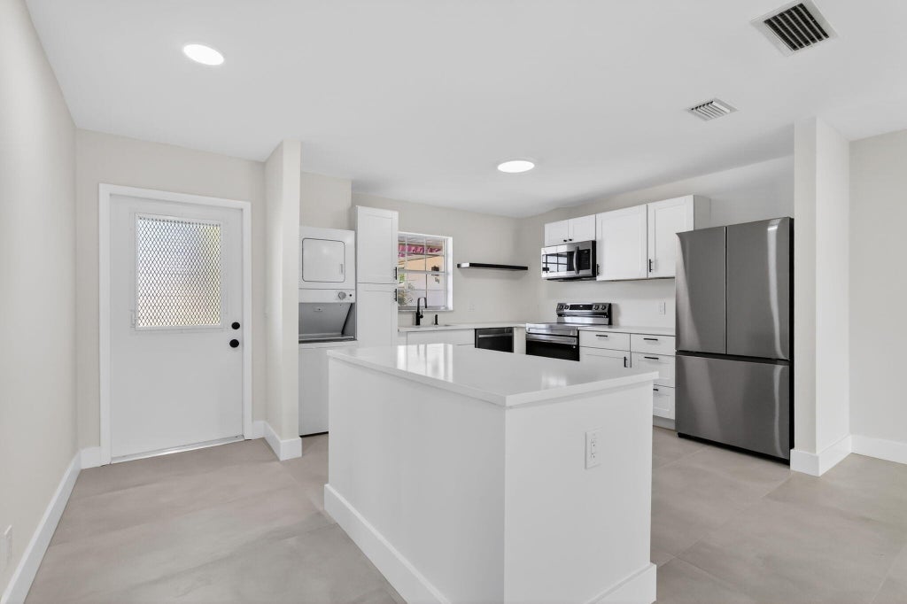 Photo of 846 Salem Lane, Lake Worth, FL 33467 (MLS # R11151573)