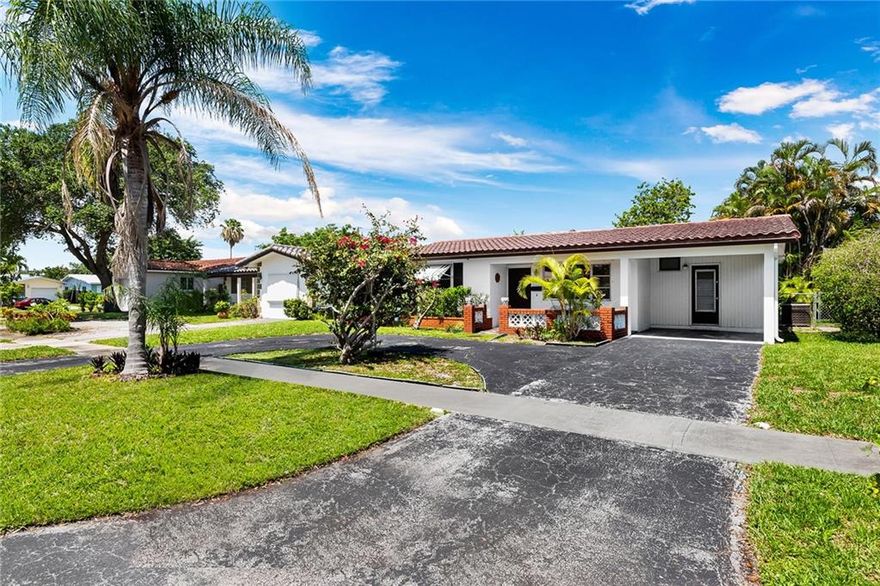 This 2 bed/ 2 bath home is fantastic opportunity to own in Hollywood Hills.  Large fenced backyard with room for a pool. Covered and screened patio area is perfect for entertaining. Large kitchen with plenty of cabinets for storage.   There is no HOA and the home is centrally located and just minutes to parks, the beach, airport or the Guitar Hotel.