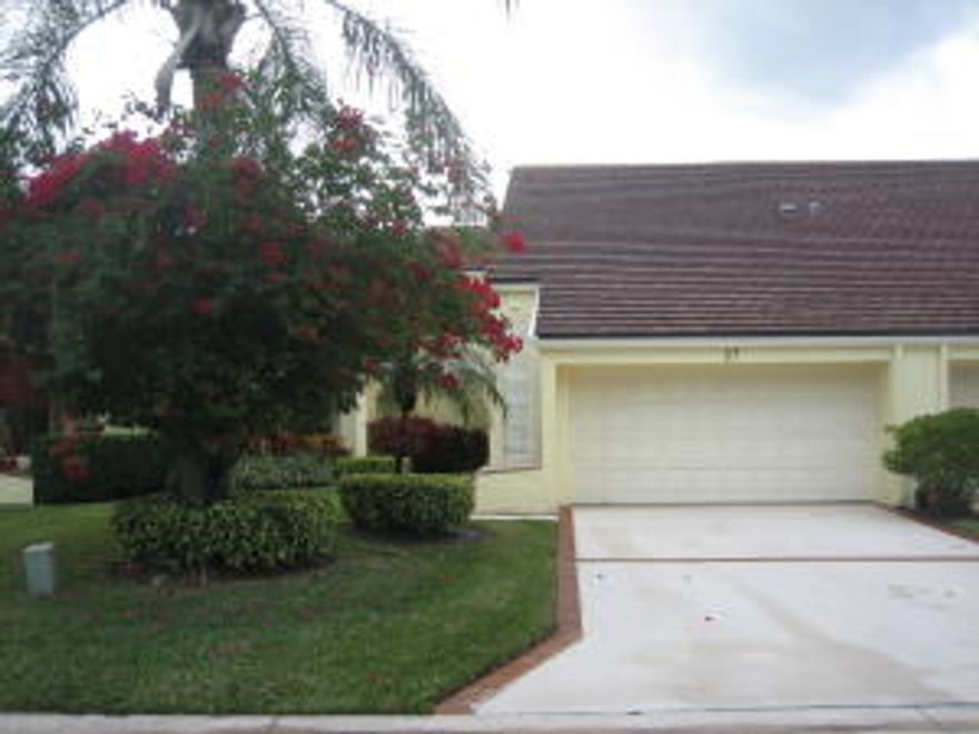 IMMACUALTE TOWNHOME IN PGA NATIONAL WITH BEAUTIFUL GOLF AND WATER VIEWS!  THIS HOME FEATURES 3 BEDROOMS - TWO LOFT AREAS 1) 8 X 7 FT, 2) 14 X 10 FT - FIREPLACES IN LIVING ROOM, DINING ROOM, AND LOFT - HUGE EAT-IN KITCHEN WITH LOADS OF CABINET SPACE - GOLF VIEWS FROM LIVING ROOM AND MASTER SUITE - MASTER BATH HAS LARGE WALK-IN CLOSET, ROMAN TUB, SEPARATE SHOWER, DUAL SINK VANITY - OVERSIZED 2ND & 3RD BEDROOMS ON SECOND FLOOR - LARGE WALK-IN CLOSET IN 2ND BEDROOM - EXTRA STORAGE CABINETS IN GARAGE PLUS STORAGE ON OTHER GARAGE SIDE AND PULL DOWN STAIRS TO ATTIC - OWL LIGHT IN DINING DOES NOT CONVEY