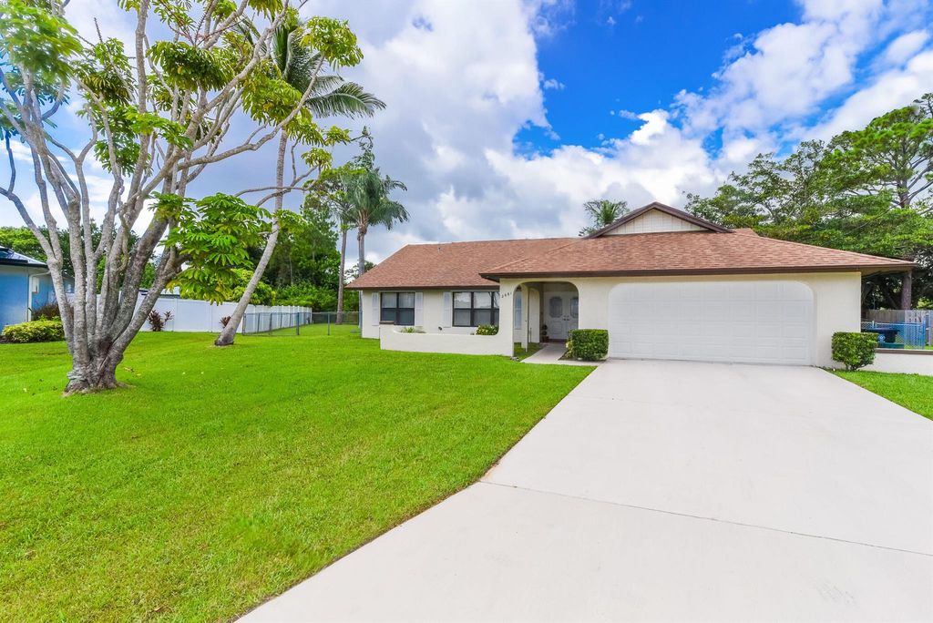 Photo of 2661 SE Opal Circle, Port Saint Lucie, FL 34952 (MLS # R11006062)