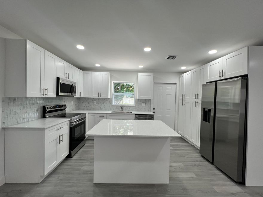 INCOME OPPORTUNITY!!!! 

Beautifully Remodeled Home with Modern Upgrades! Leased until 10/2026.

This stunning home has been completely updated with a new roof and trusses, impact-resistant windows, new water heater, appliances, and AC! This means minimal need for any repairs or service while you enjoy the peace of mind of great tenants and quality work. 

The updated kitchen includes granite counters, soft closed cabinet and pantry and a large pantry for extra storage. Don't miss this opportunity to own a piece of st lucie county, upgraded with all the essentials

Occupied! Do not disturb tenants!