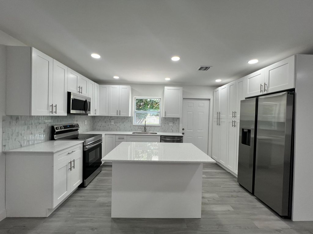 Photo of 2801 Avenue Q Avenue, Fort Pierce, FL 34947 (MLS # R11164909)