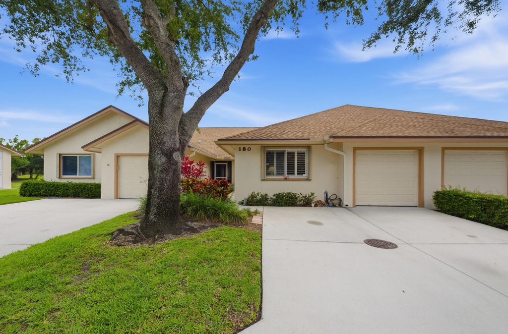 Photo of 180 Par Drive, Royal Palm Beach, FL 33411 (MLS # B26042815)