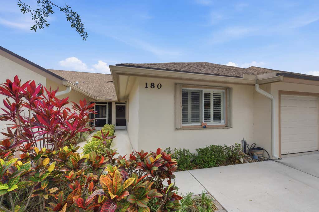 Photo of 180 Par Drive, Royal Palm Beach, FL 33411 (MLS # B26042815)