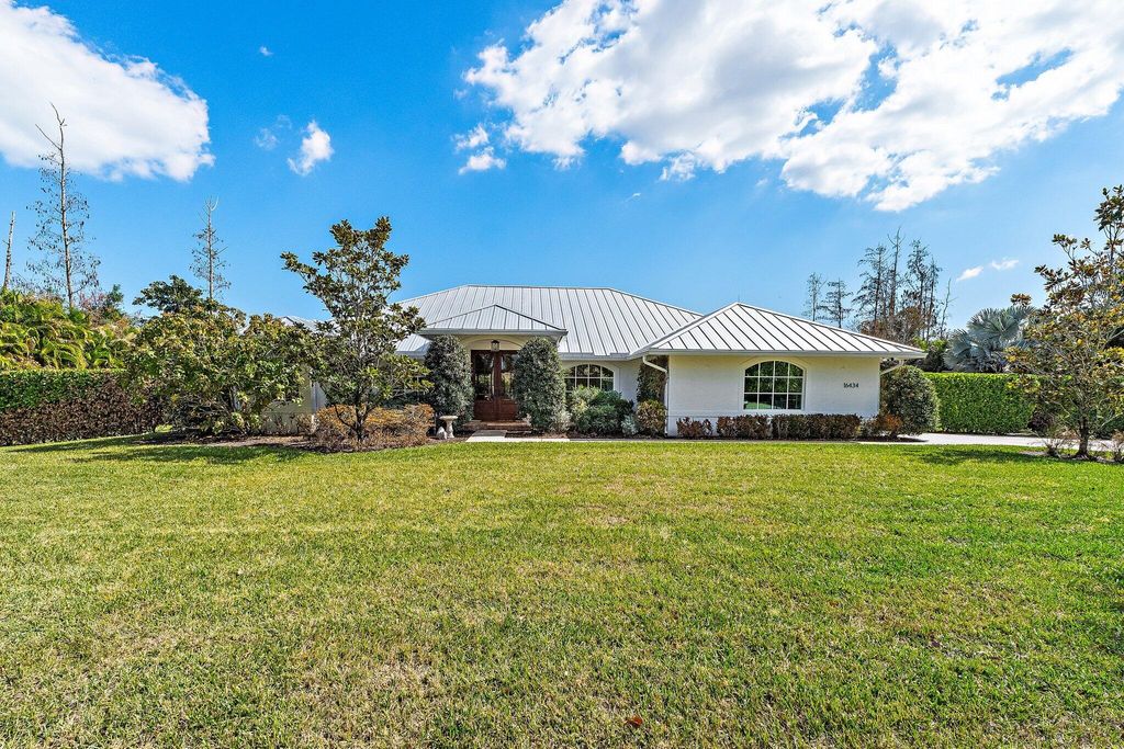 Photo of 16434 75th Way N, Palm Beach Gardens, FL 33418 (MLS # R11162474)