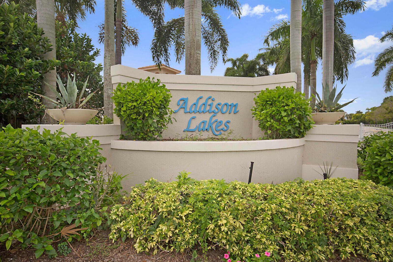 Beautifully maintained & updated corner villa with sparkling lake views in the gated community of Addison Lakes. Eat-in kitchen recently remodeled w/white shaker cabinets, quartz counters, tile backsplash, under cabinet lighting, HIGH ceilings, two pantries & stainless steel appliances. Master Suite w/high ceilings and spacious walk-in closet has an elegant Master Bath recently remodeled w/grey double vanity, soaking tub+ separate shower w/seamless enclosure. Tile throughout. Interior laundry room w/cabinets & sink. NEW roof just installed & assessment has been paid in full. Community pool, fitness area, cable, lawn/landscaping included in low HOA fee. Association states 55+ but allows 20% younger. ALL AGES OVER 19 are welcome. Association approval required. Allow 15 -30 days.
