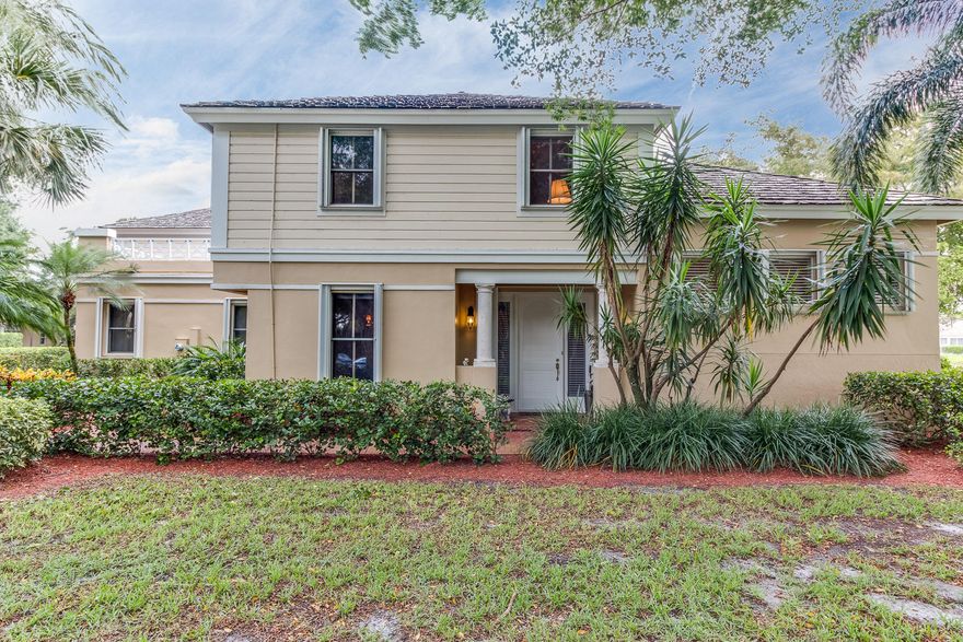 HUGE PRICE REDUCTION--The most exquisite lot in Cambridge Park. Surrounded by lake and beautiful greenbelt at end of private cul de sac. This two (2) bedroom plus loft and 2 1/2 bath end unit is immaculate, light, spacious and elegant. Hardwood floors, neutral beige carpeting and nicely upgraded kitchen with white cabinetry and granite counter tops make this a home to enjoy. Wonderful enclosed patio overlooking the tranquil lake opens from eat in kitchen and living room. Large walk in pantry, newer stove, refrigerator and oven makes entertaining a pleasure. Plantation shutters inside and accordion shutters on windows outside. Roof replaced in 2006. Move right in!