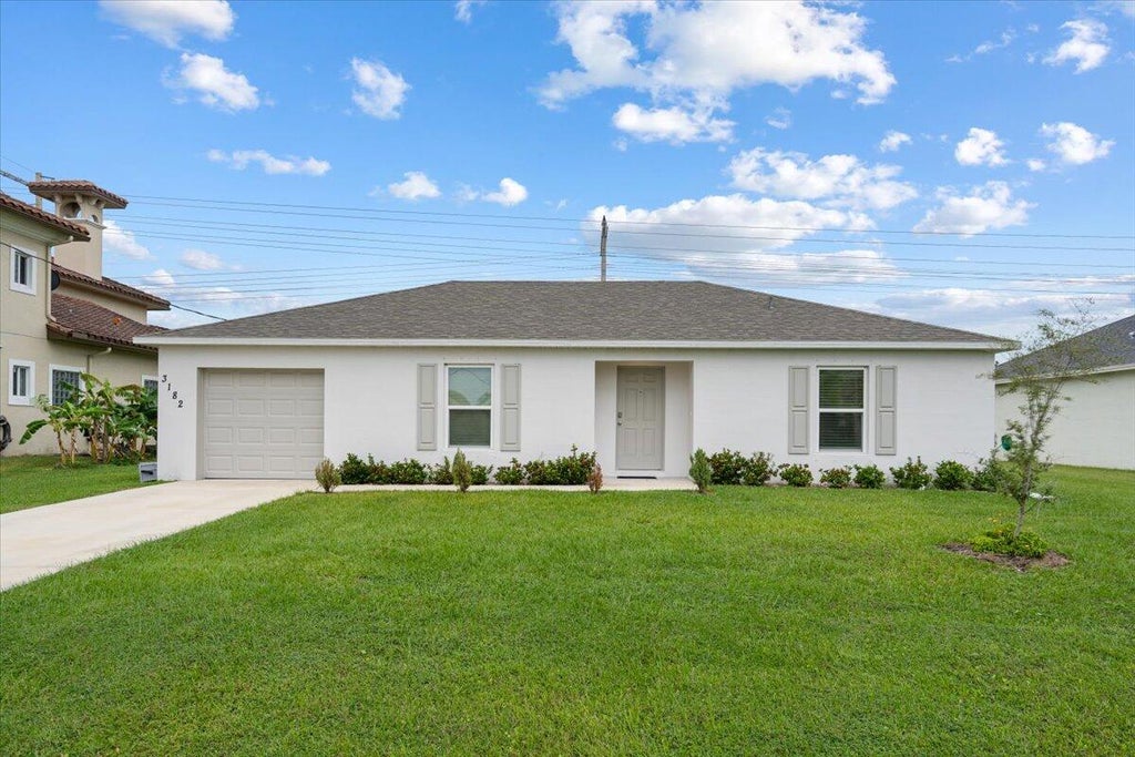 Photo of 3182 SW Letchworth Street, Port Saint Lucie, FL 34953 (MLS # R11040947)