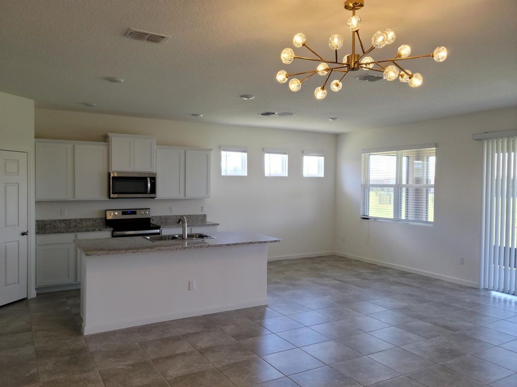 Photo of 12354 SW Arabella Drive, Port Saint Lucie, FL 34987 (MLS # R11081250)