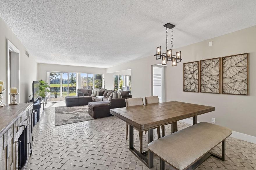 Price-to-sell corner condo in Fountains of Palm Beach! This largest unit in the building offers 3 beds, ~1,700 SF, and is one of only 18 units. Updates include a new laundry room (W/D allowed), guest bath renovation, refreshed moldings/door frames, wallpaper removed and painted, and impact windows in the primary suite. HOA covers water, cable TV & internet, 24-hr manned gate & lobby security, roof and structural insurance. No mandatory club membership; optional social/golf/tennis available. Community amenities include golf, clubhouse, pool, fitness center, tennis & pickleball courts, bocce, dining and active social events. Great Lake Worth location near shopping, dining, and beaches.