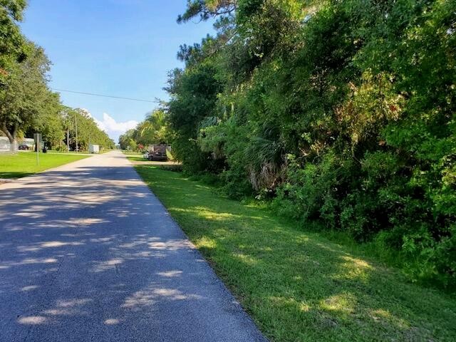 Beautiful oversize corner lot .3 acres. Located in the Lakewood Park neighborhood. Lakewood Park offers many amenities. 25 public lakes, two separate public parks featuring a public pool, multiple baseball fields, soccer fields, basketball courts, tennis, playground and walking trails. Easy access to I-95, County Taxes only.