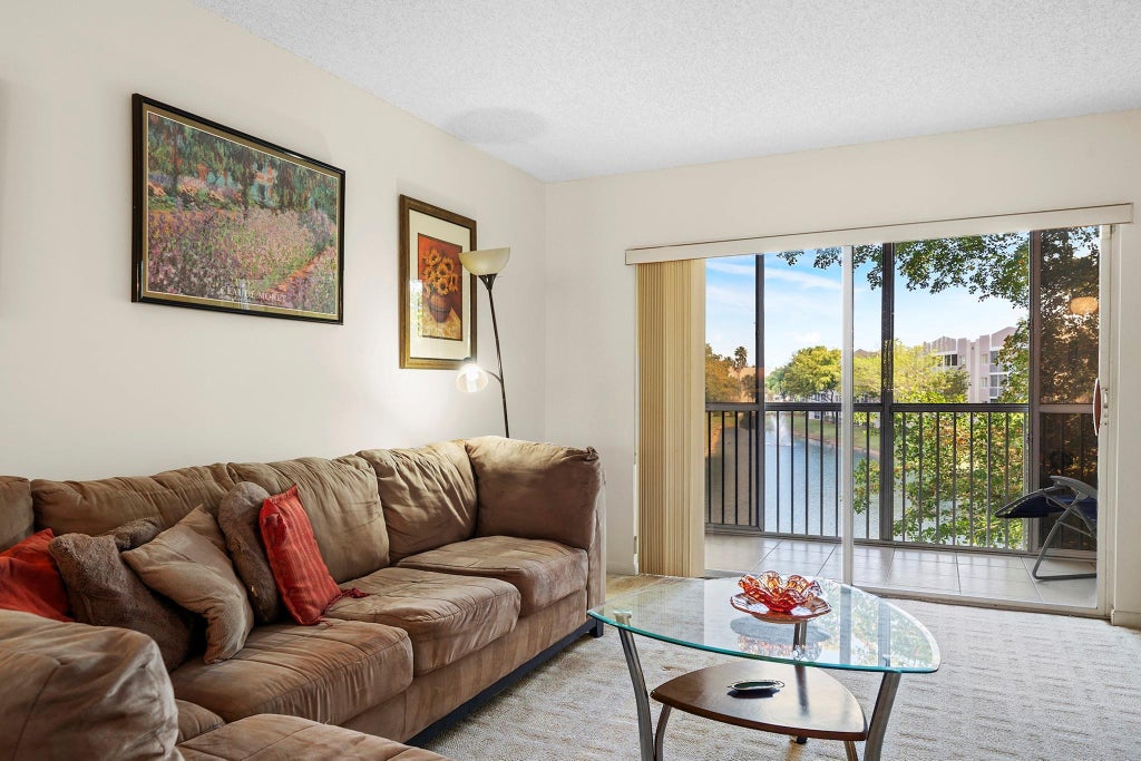 Photo of 9525 Weldon Circle #314, Tamarac, FL 33321 (MLS # F10444538)