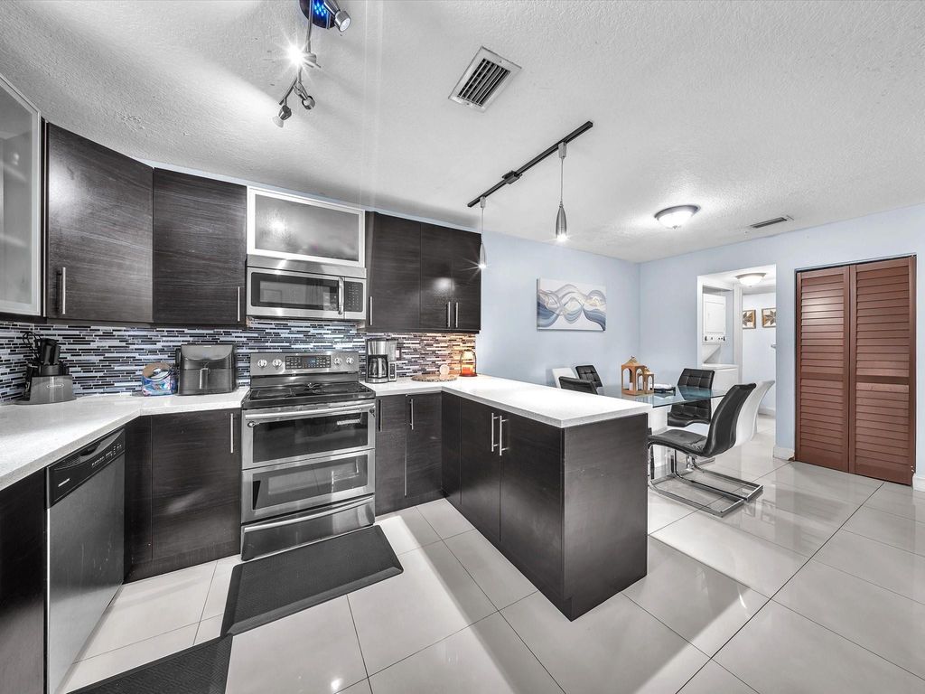 Photo of 2496 NW 99th Avenue, Coral Springs, FL 33065 (MLS # F10555550)