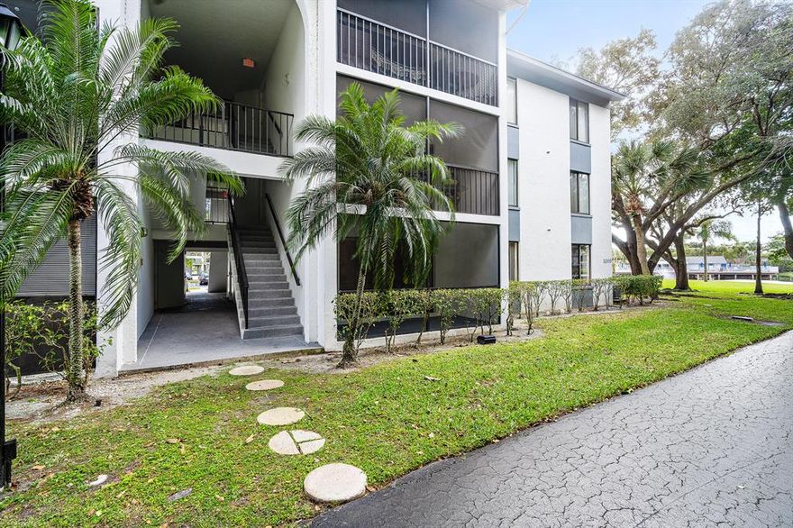 Charming 2 Bed 2 Bath Ground floor condo! This unit features a screened patio, gorgeous lake and partial pool views! A MUST SEE!