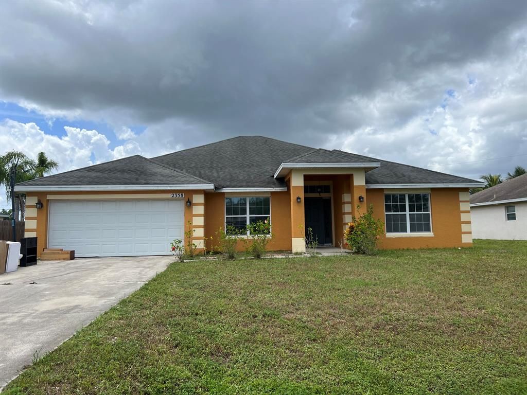 Photo of 2358 SE Addison Street, Port Saint Lucie, FL 34984 (MLS # R10829163)