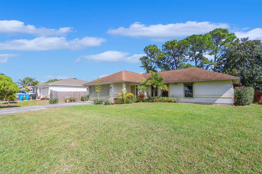 Photo of 952 SW Commonwealth Road, Port Saint Lucie, FL 34953 (MLS # R10958301)
