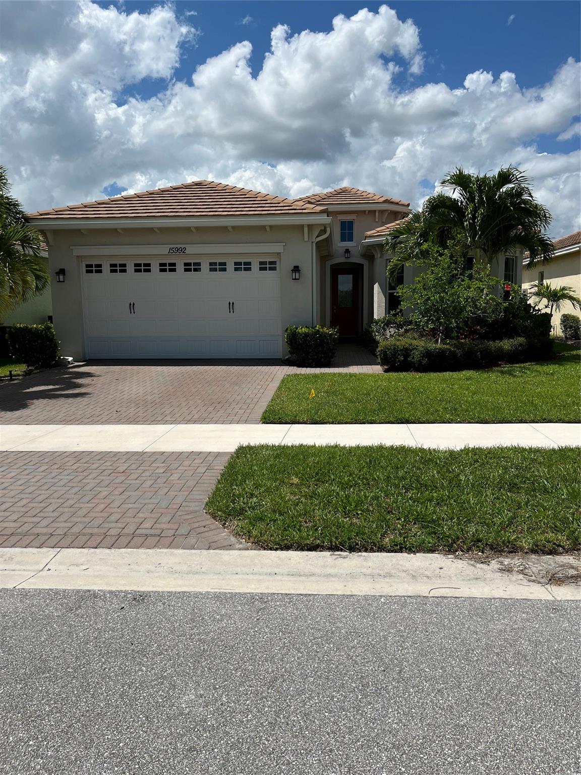 Welcome to this lovely 3 bedroom 2 bathroom 2 car garage home located in The Hammocks of Westlake. Enjoy your back yard with lake views and fruit trees. You can ride your golfcart or walk the nature trails to the amenity center with a lagoon pool, splash pad, slides, playgrounds, basketball courts, and a dog park. Schedule your appointment today.