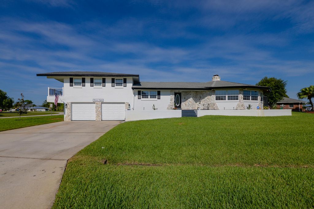 Photo of 1380 SE Palm Beach Road, Port Saint Lucie, FL 34952 (MLS # R10803864)