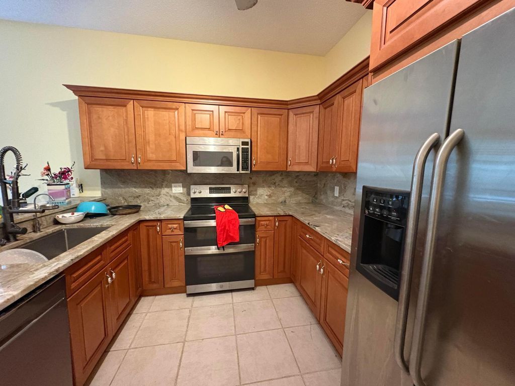 Photo of 10714 Kasmir Court, Boynton Beach, FL 33437 (MLS # B26000105)