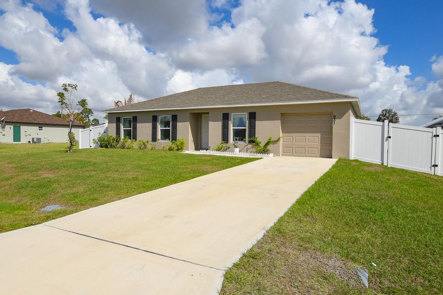 PRICE IMPROVEMENT! Now offered at $395,000. Built in 2023, this move-in ready 3-bedroom, 2-bath home offers modern construction with no HOA restrictions. Open-concept layout provides functional living space, while the oversized fenced yard offers room for a future pool or outdoor living area. Appliances included. Attractive price point for newer construction in Port St. Lucie. Conveniently located near major roadways, shopping, and dining. Schedule your private showing today.