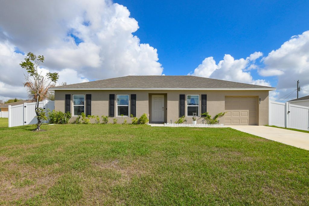 Photo of 931 SW Sultan Drive, Port Saint Lucie, FL 34953 (MLS # B26000988)