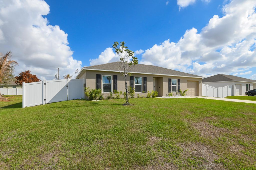 Photo of 931 SW Sultan Drive, Port Saint Lucie, FL 34953 (MLS # B26000988)