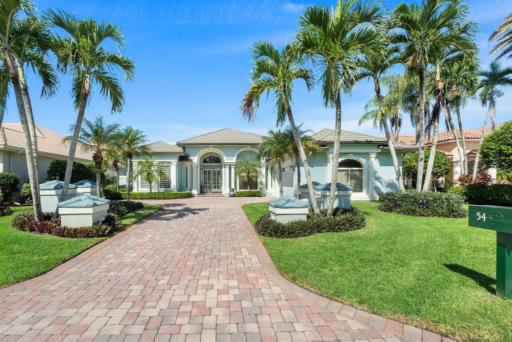 Photo of 54 CAYMAN Place, Palm Beach Gardens, FL 33418 (MLS # B26082967)