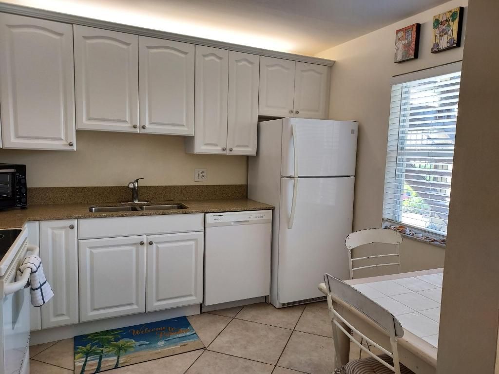 Photo of 717 S Us Highway 1 #103, Jupiter, FL 33477 (MLS # R10966949)