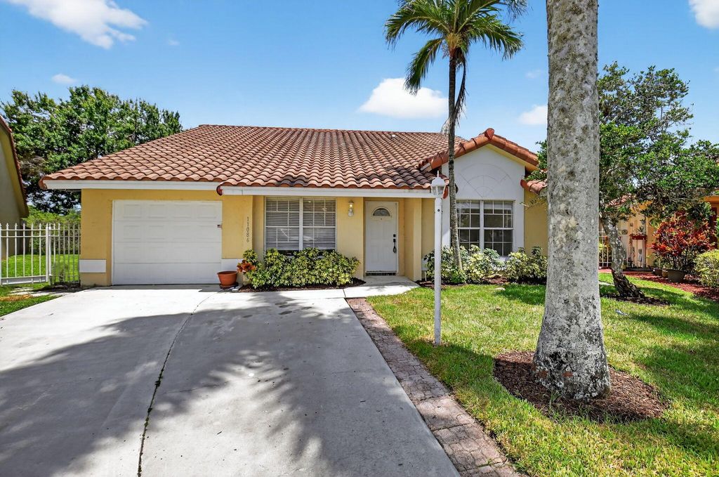 Photo of 11086 Lakeaire Circle, Boca Raton, FL 33498 (MLS # R11108122)