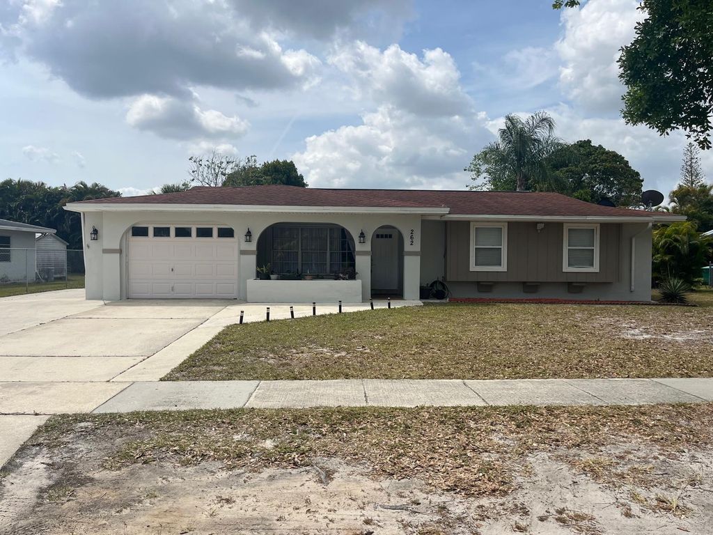 Photo of 262 NE Floresta Drive, Port Saint Lucie, FL 34983 (MLS # B26012821)