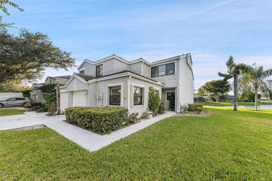 MAJOR PRICE IMPROVEMENT! WILL NOT LAST ...Beautifully maintained lakefront townhome offering generous living space and elegant finishes. A versatile loft provides the option for a fourth bedroom or office. Upgraded with a newer roof, brand-new impact windows and doors,new garage door, newer stainless steel appliances, central A/C, and water heater. The chef’s kitchen features granite countertops, rich wood cabinetry, and ample storage. Neutral tones throughout create a bright, timeless feel. Located minutes to golf course, dining and shopping. Only 15 minutes to Fort Lauderdale beaches and airport.