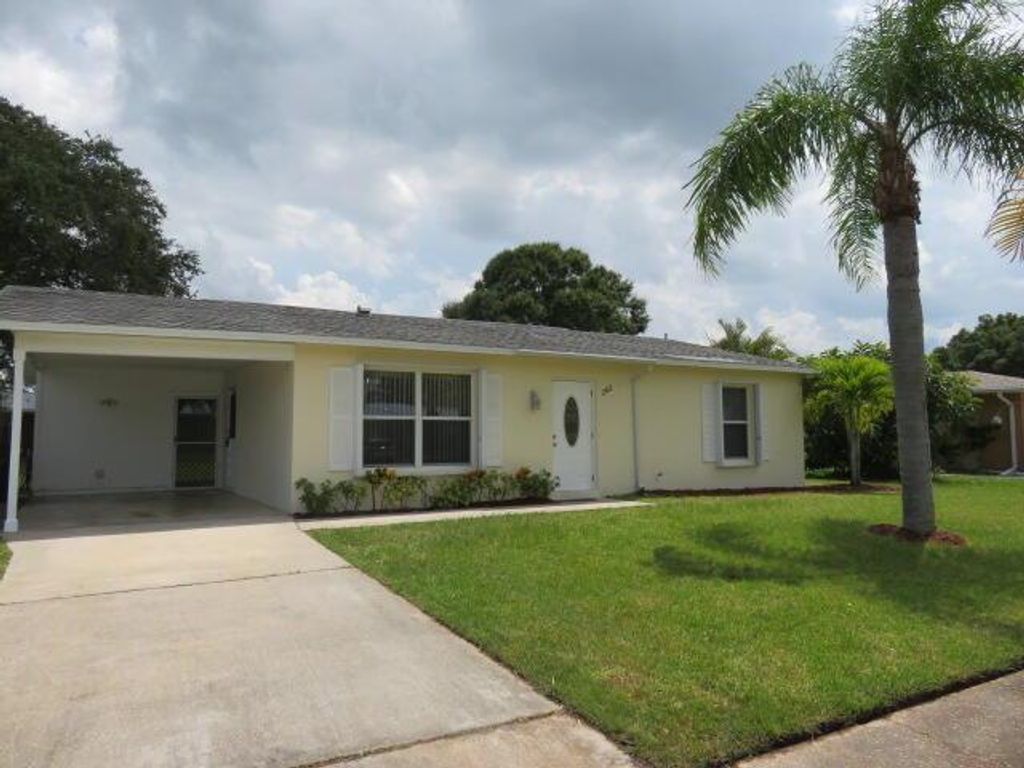 Photo of 262 NE Camelot Drive, Port St Lucie, FL 34983 (MLS # R10896777)