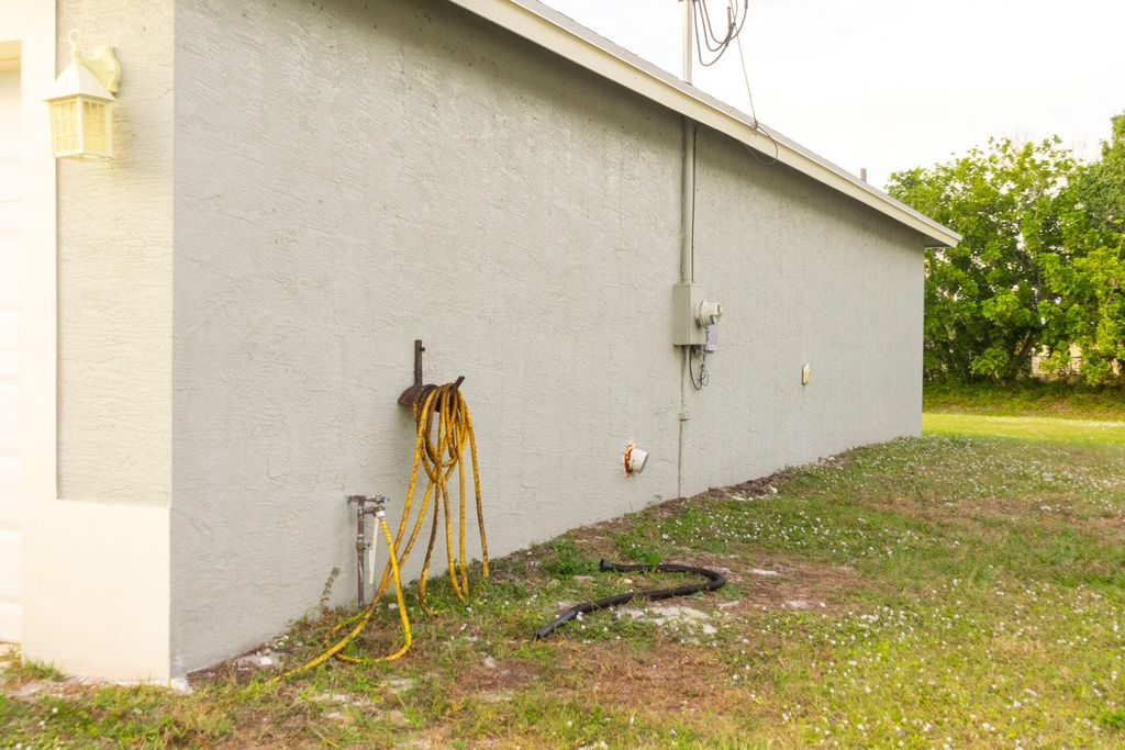 Photo of 2325 SE Calcutta Circle, Port Saint Lucie, FL 34952 (MLS # R11149478)