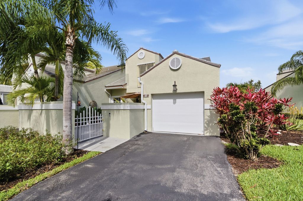 Photo of 47 N Lakeshore Drive, Hypoluxo, FL 33462 (MLS # B26015465)