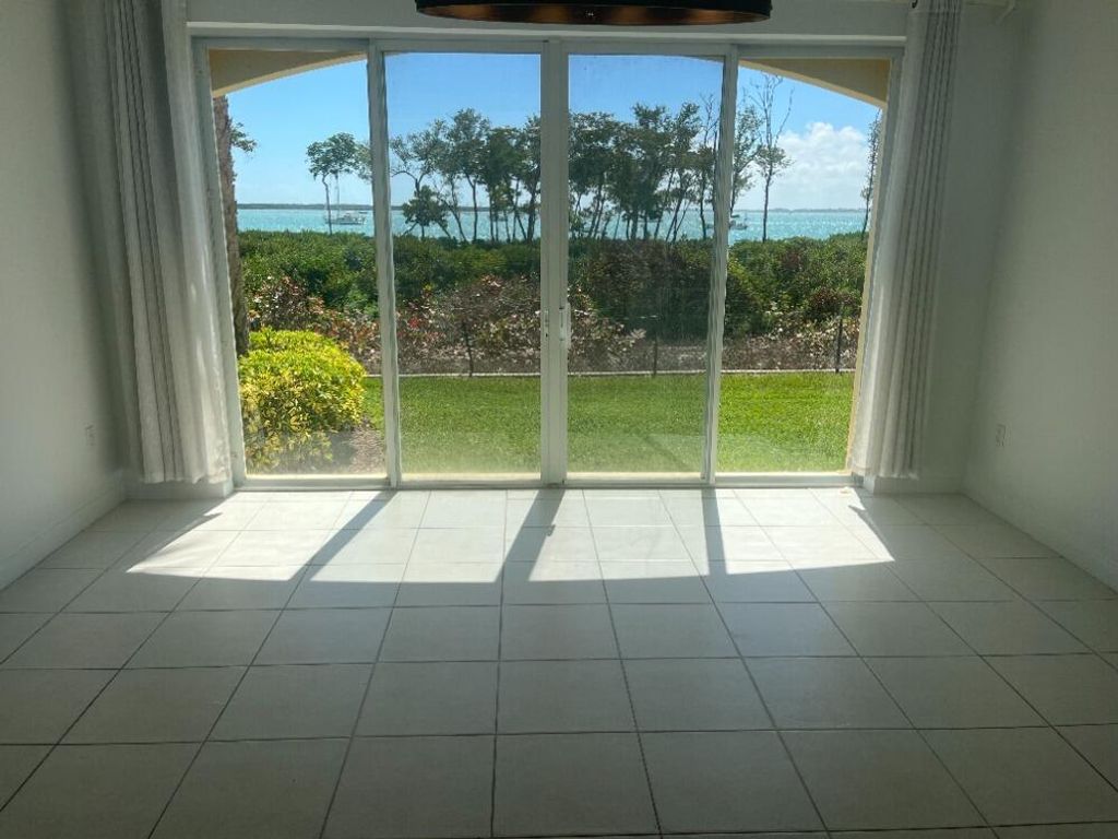 Photo of 23 Harbor Isle Dr Drive W #104, Fort Pierce, FL 34949 (MLS # R11165460)