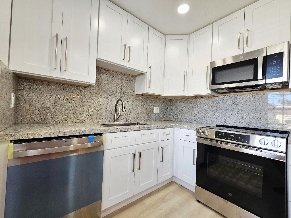 Photo of 835 Salem Lane, Lake Worth, FL 33467 (MLS # B26023906)