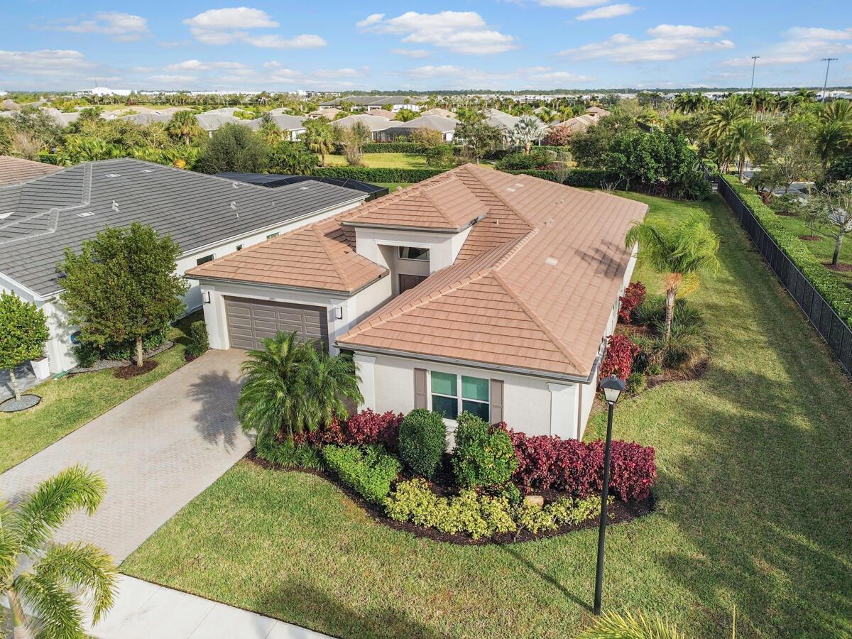 Welcome to Riverland, where luxury resort-style living is like no other in Port St Lucie! The Caroline is one of Riverland's most popular models and perfect for entertaining. This beautiful home has a gorgeous expansive eastern garden view from the back patio and features numerous upgrades. This premier oversized lot is located at the end of the street with its own entrance to the 2-lane scenic landscaped miles long Paseo for golf carts, biking and walking. The amenities include a 34,000 sq ft clubhouse with stunning resort-style pool, restaurant, amazing live entertainment, dozens of clubs; a 24-acre fitness campus w/ a state-of-the-art gym, 3 outdoor pools and 1 indoor pool; learn to cook, paint, or even create pottery at the arts and culture center; The upcoming