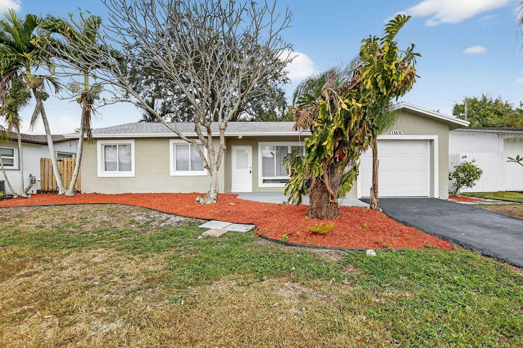 Photo of 11631 NW 32nd Manor, Sunrise, FL 33323 (MLS # R11145111)