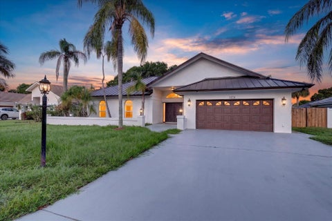 Photo of 3230 Alexander Court, Palm City, FL 34990 (MLS # B26070824)