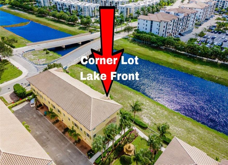 Stunning Newer construction LAKE FRONT tri-level townhome Almost 2,000 sqft! CORNER LOT! Open concept and move in ready 3 Bedrooms, 2 Dens (can be converted into 2 more bedrooms), 2 full baths and 2 half baths (can be converted into full baths)! Full size Laundry with newer W/D, Newer AC, Brand New Water Heater! Vaulted Ceiling, recessed lighting & No carpet! New Master baths! Lots of storage space, 2 car garage! Hurricane protection!  Conveniently located walking distance to lots of shops, coffee shops, bars, restaurants, and dog park! Community offers pools, lakes, gazebos, gym, and fountains. Only minutes from major highways & the beaches. GREAT INVESTMENT! Can be rented out immediately! This will not last!!!
