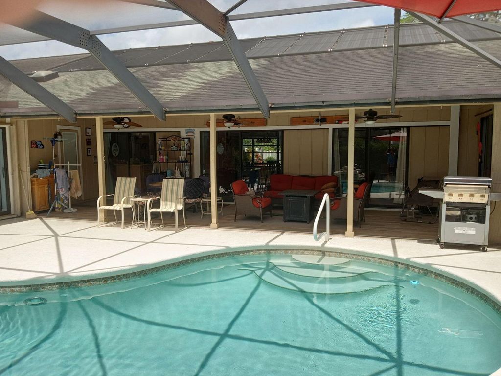 Photo of 1822 SE Beving Avenue, Port Saint Lucie, FL 34952 (MLS # B26009896)