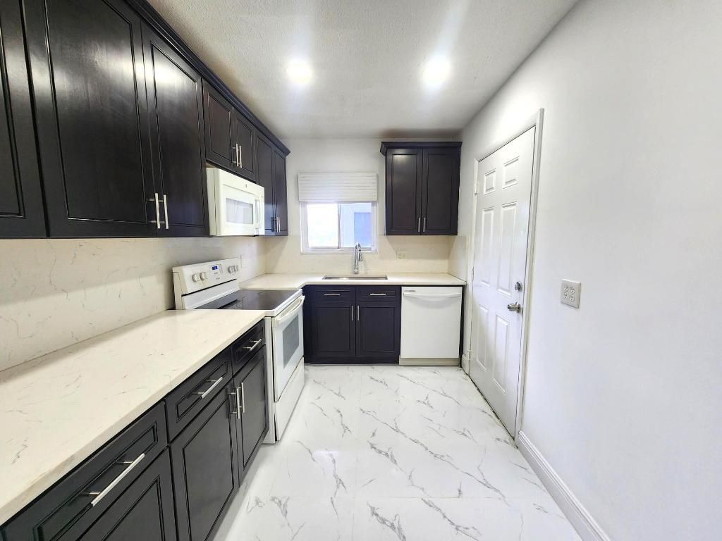 Photo of 1410 S Federal Highway #207, Lake Worth Beach, FL 33460 (MLS # R11154183)