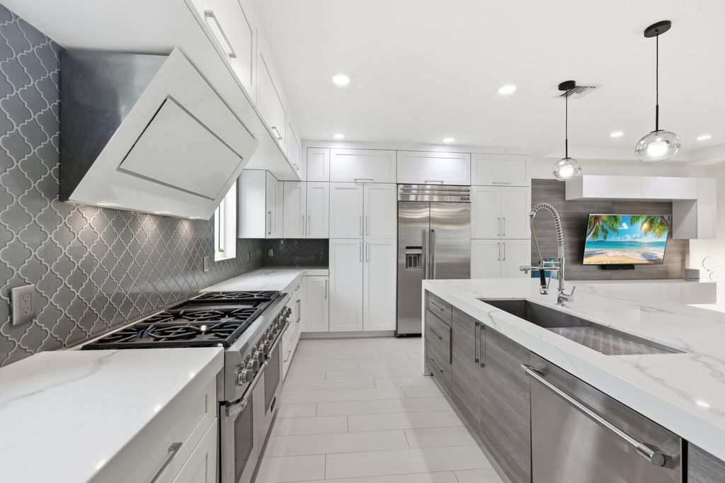 Photo of 1044 NW 6th Drive, Boca Raton, FL 33486 (MLS # R11159529)