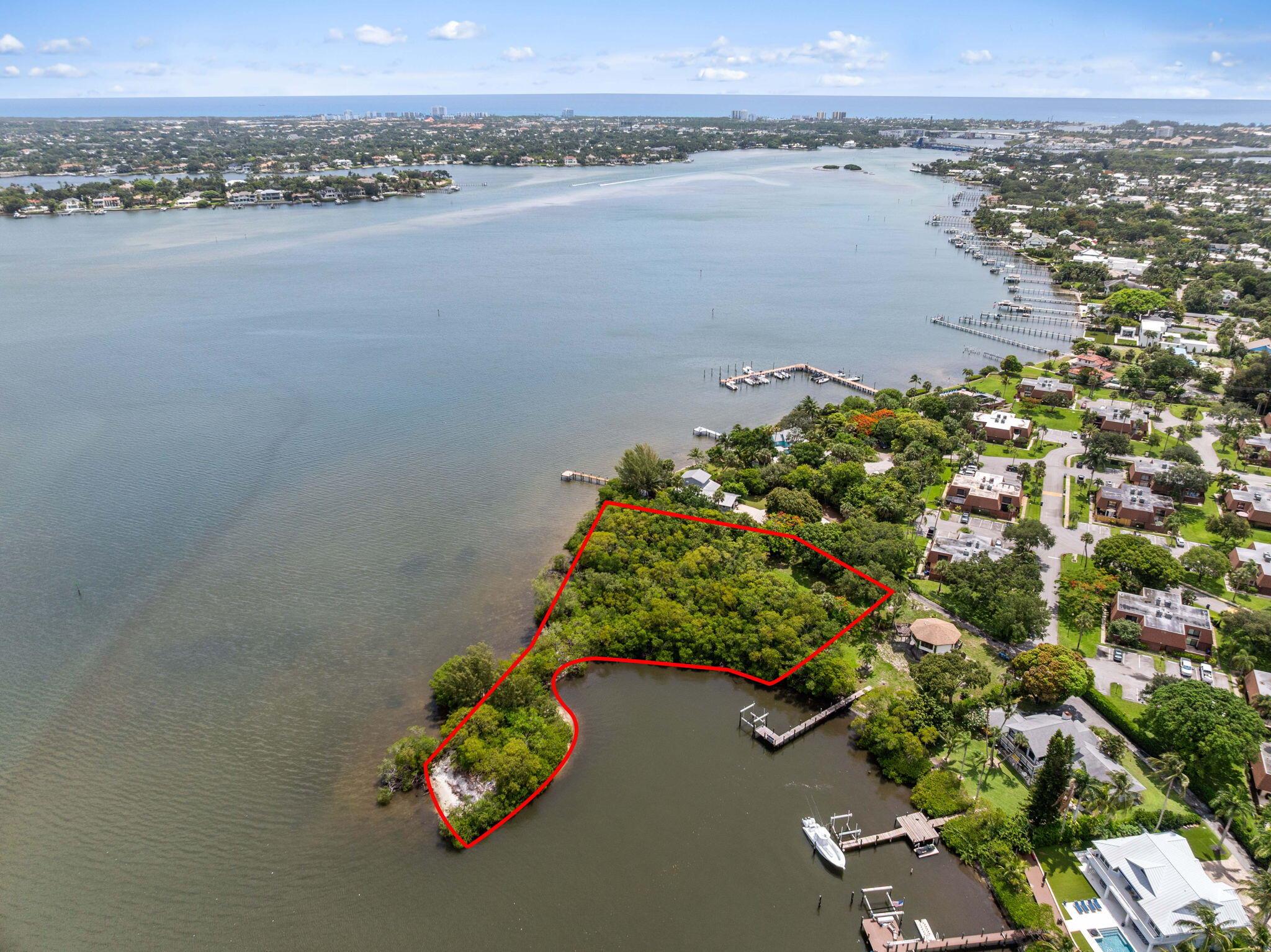 This is the only known property in Jupiter offering over 1,000 feet of private waterfront along the scenic Loxahatchee Rivercomplete with its own private island. A rare opportunity to own one of the most unique land parcels in the area, featuring 69,696 sq ft (1.6 acres) of land with 10,000+ sq ft already cleared and approx. 5,000-6,000 sq ft currently buildable (expandable with variances and mitigation).A DEP permit has been approved for a ~100 ft dock, and a certified expert has confirmed that mangroves on-site may be significantly trimmed to open views and improve usability. With direct access to the water, this property offers unmatched potential for a luxury estate or retreat.Located just minutes from 1000 North, The Woods, and the Love Street dining district, this propert